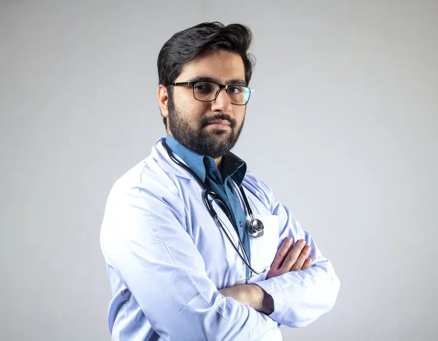 Experienced physician standing confidently in a clinical setting