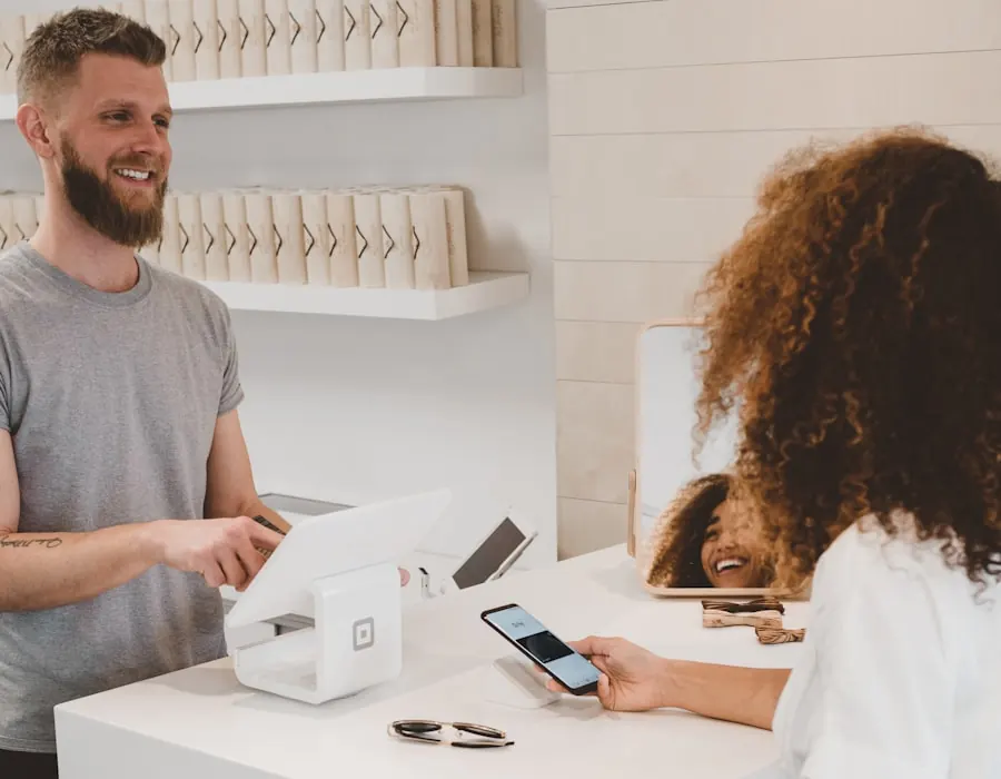 Small business owner helping a customer at the point of sale