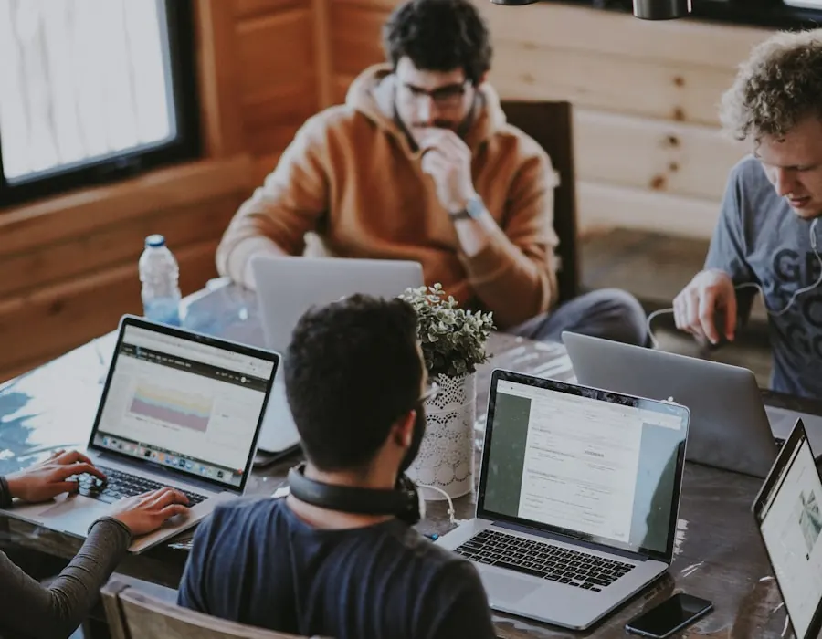 Customer and sales leaders collaborating around a table